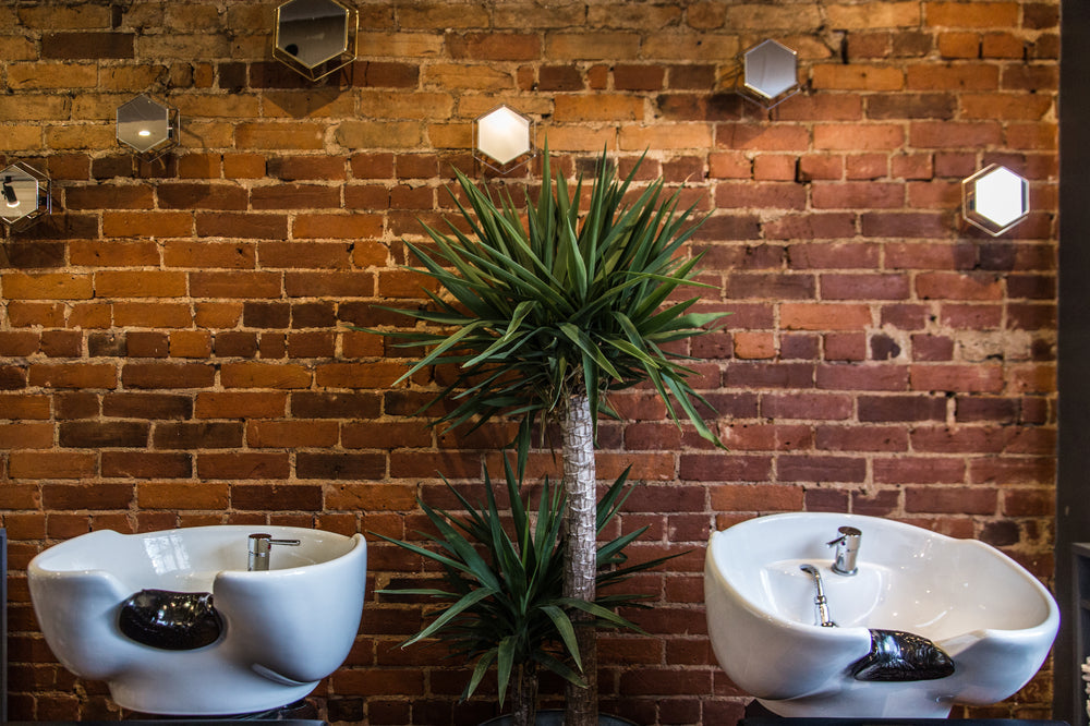 hair-salon-sinks-on-red-brick