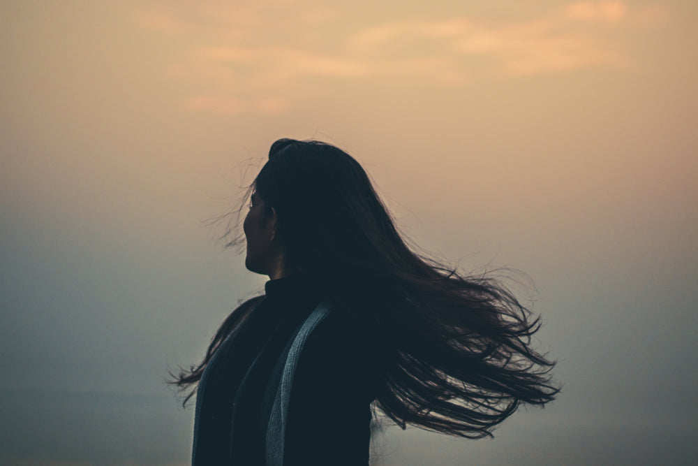 person-tosses-their-hair-away-from-frame